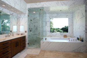Picture of Spindler Construction frameless glass steam shower with marble tile and custom cabinets austin texas