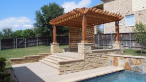 Spindler Construction Pergola with screening creates poolside shade even in afternoon sun