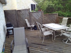 cedar lattice privacy wall and tired deck